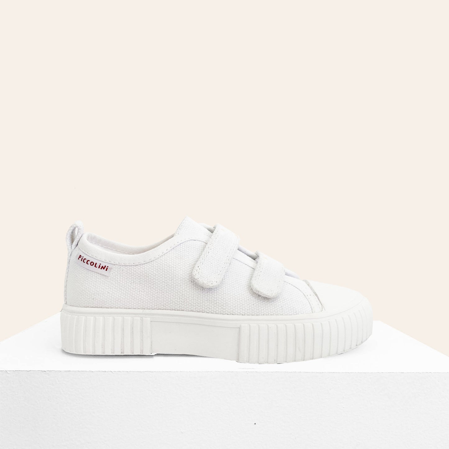 White lowtop kids sneaker